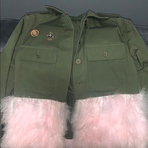 Army jacket with pink feathers